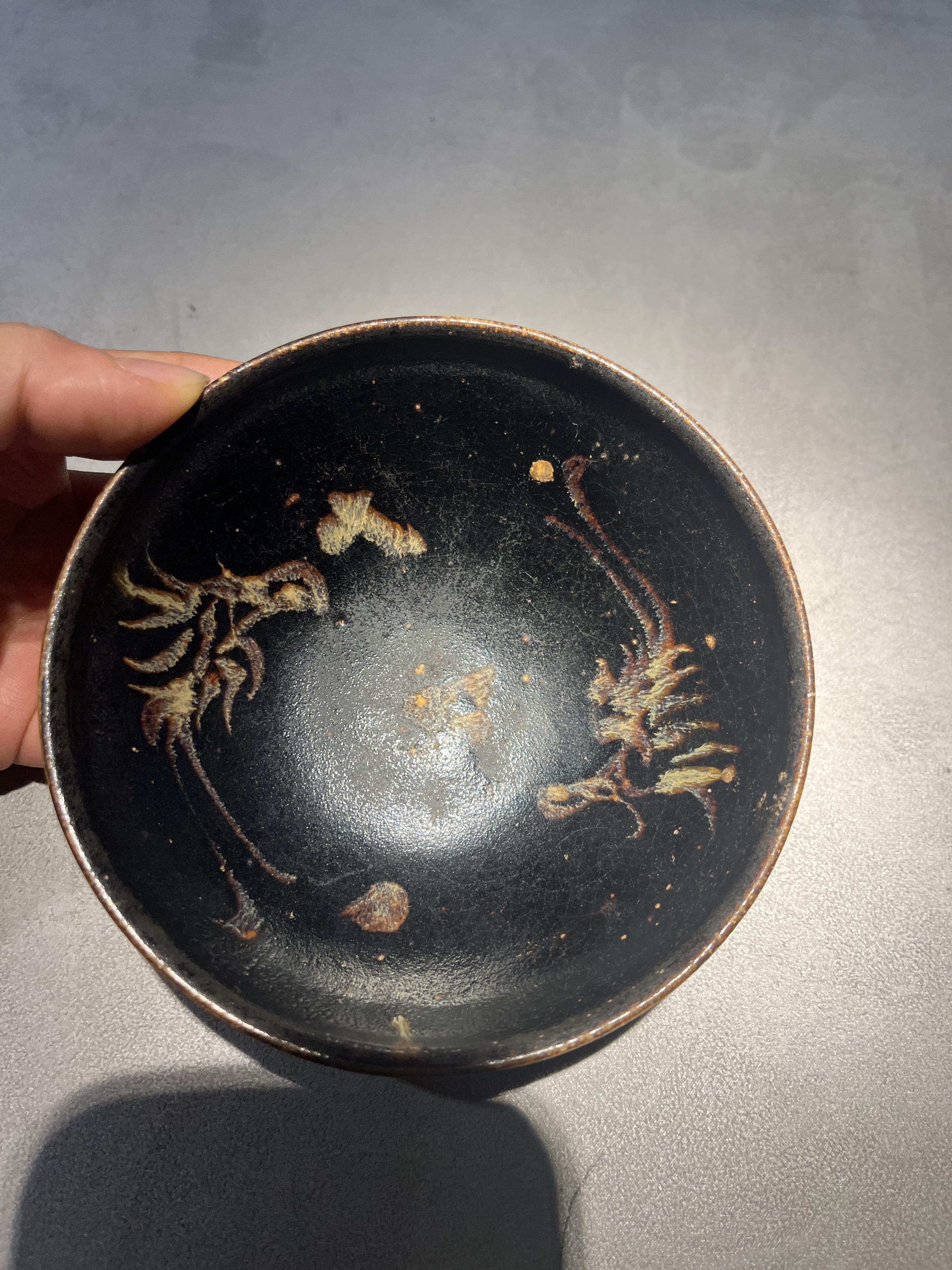 宋代吉州窑凤纹黑釉褐彩碗