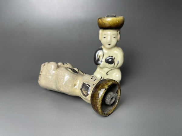 古玩陶瓷清代磁州窯嬰戲形燭臺拍賣,當前價格850元