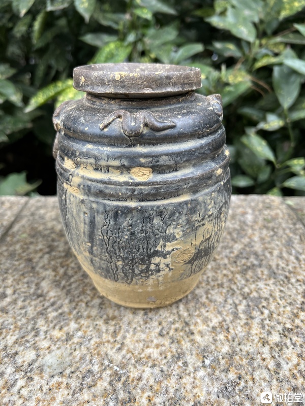 古玩陶瓷宋元時期褐釉貼塑龍紋罐拍賣,當前價格999元