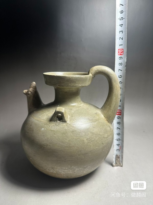 古玩轉(zhuǎn)賣越窯青瓷雞首壺,注意品相拍賣,當(dāng)前價(jià)格1999元