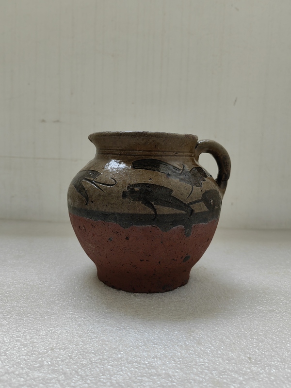 古玩陶瓷黃釉刻花卉紋花澆拍賣,當(dāng)前價(jià)格567元