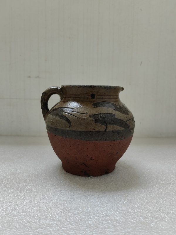 古玩陶瓷黃釉刻花卉紋花澆拍賣,當(dāng)前價(jià)格567元