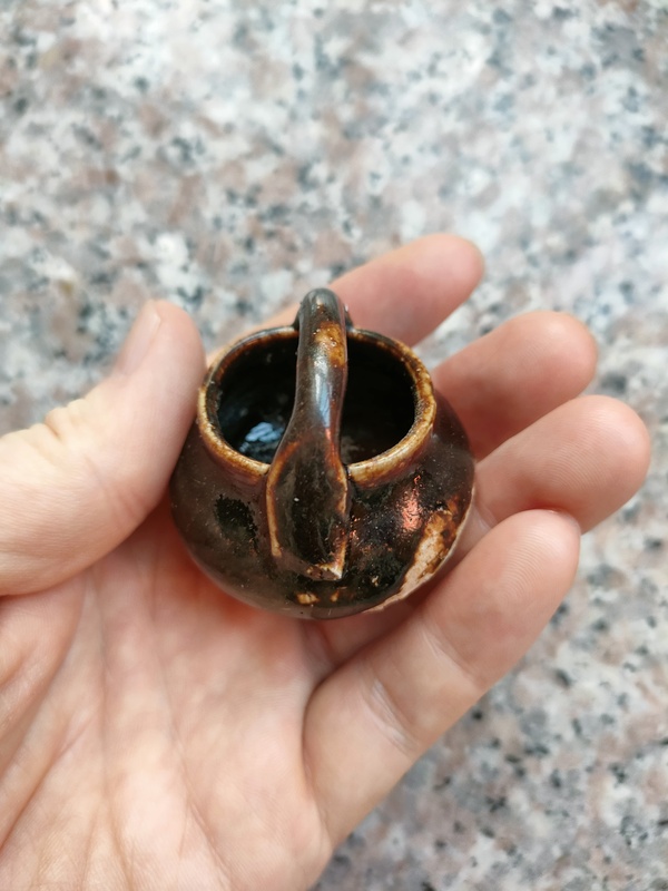 古玩陶瓷唐五代定窯黑釉小提梁拍賣，當(dāng)前價(jià)格600元