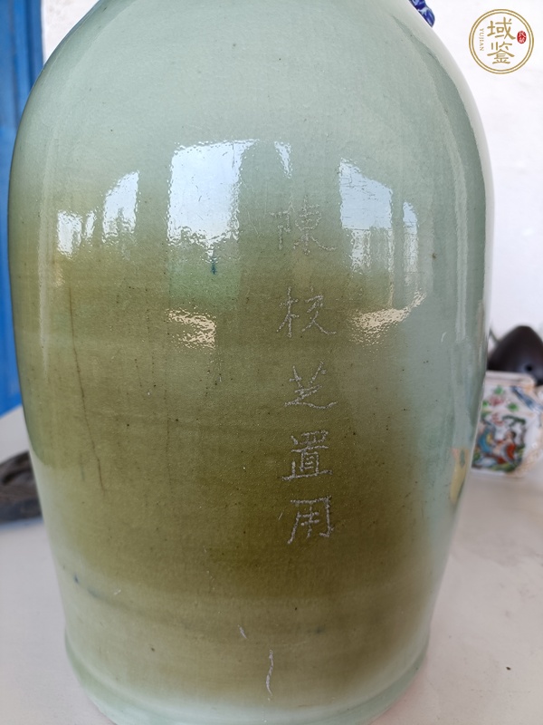 古玩陶瓷豆青釉青花花卉紋撣瓶真品鑒賞圖