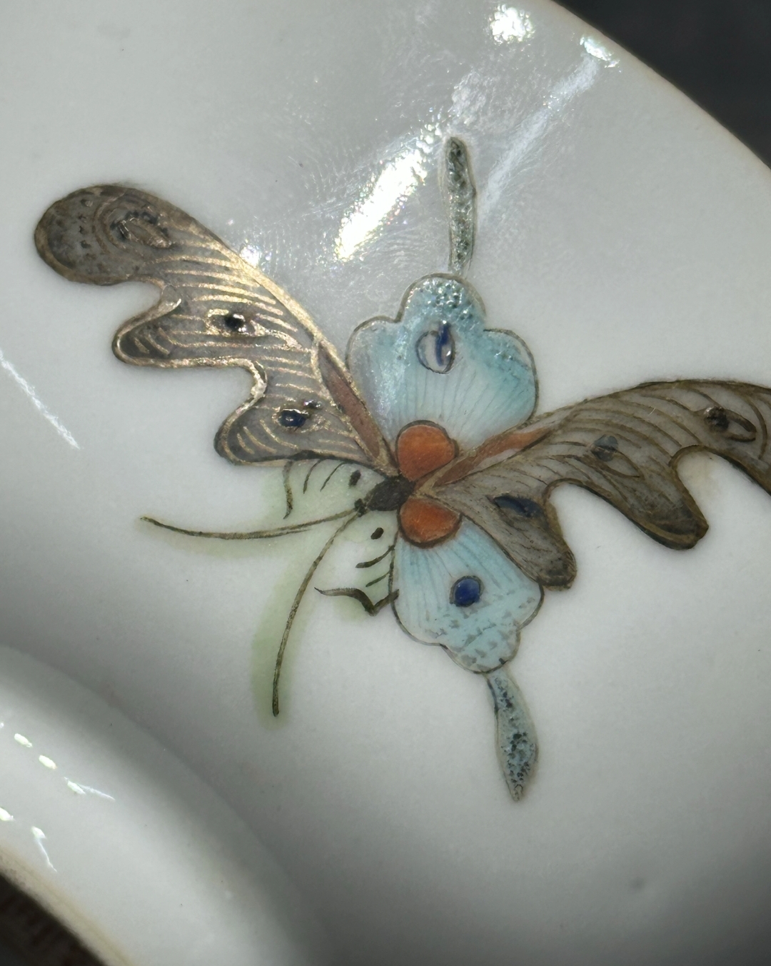 A famille-rose 'butterfly' bowl, Mark and period of Guangxu
