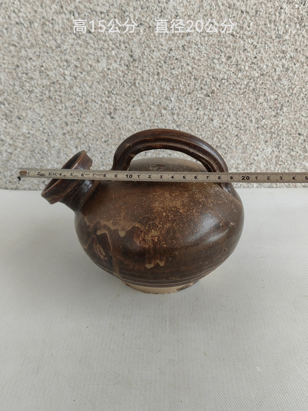 古玩陶瓷褐釉提梁壺拍賣，當(dāng)前價(jià)格580元