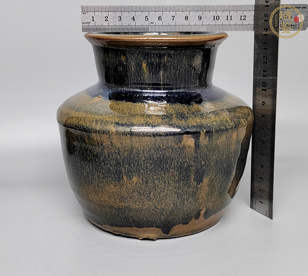 古玩陶瓷窯變黑釉高領(lǐng)罐真品鑒賞圖