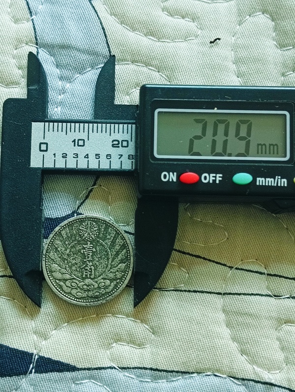 古玩錢幣滿洲國雙馬頭壹角拍賣，當(dāng)前價格100元