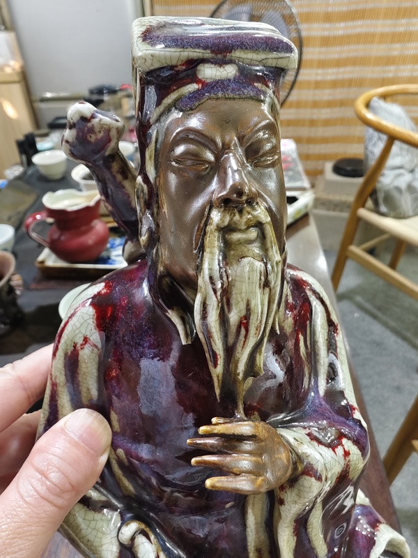 古玩轉(zhuǎn)賣窯變紅釉呂洞賓塑像拍賣，當前價格6800元