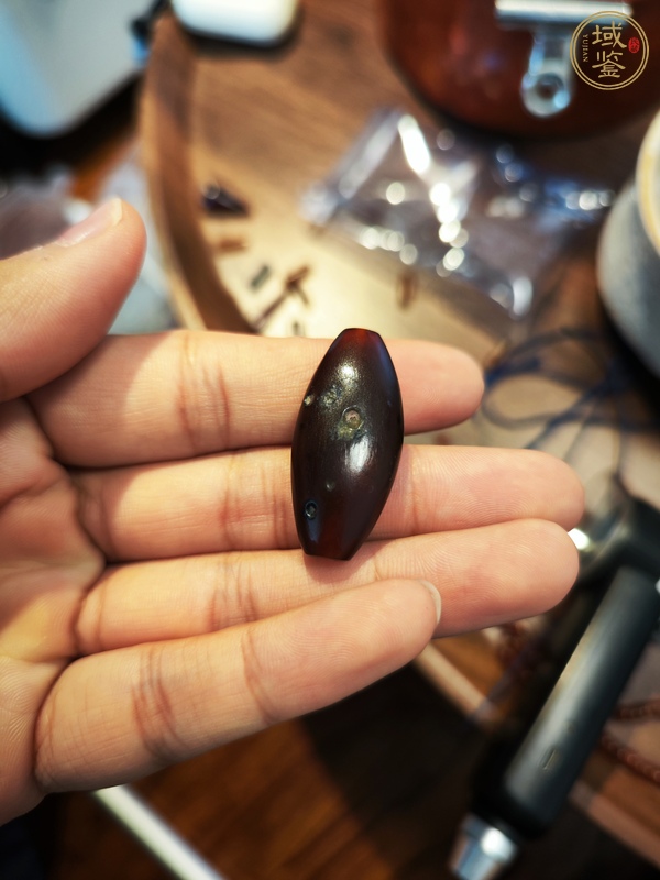 古玩瑪瑙橄欖型珠真品鑒賞圖