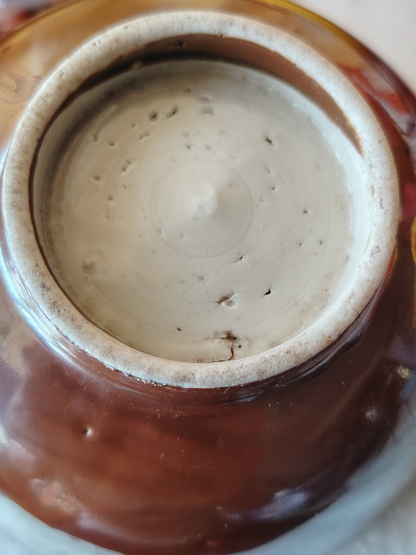 古玩陶瓷紫金釉開光花卉紋茶碗拍賣,當前價格110元