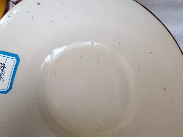 古玩陶瓷紫金釉開光花卉紋茶碗拍賣,當前價格110元