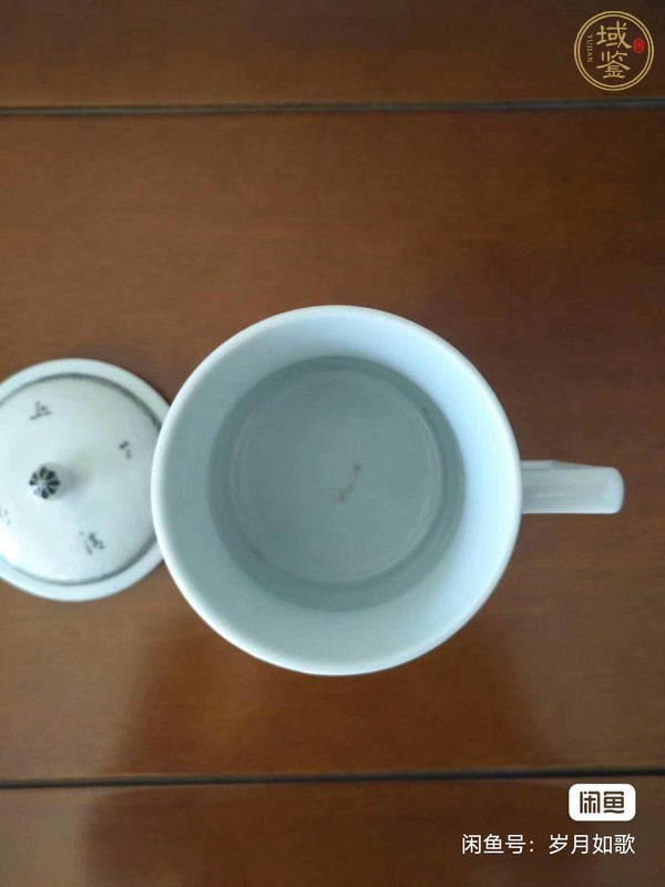 古玩陶瓷雪景圖執(zhí)杯真品鑒賞圖