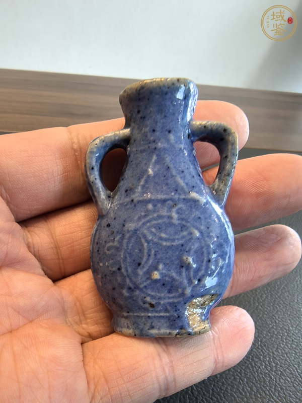 古玩陶瓷霽藍釉銅錢紋瓶真品鑒賞圖