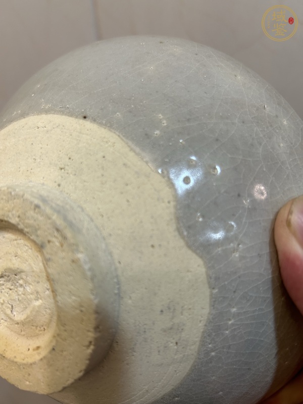 古玩陶瓷卵白釉刻仰蓮紋碗真品鑒賞圖