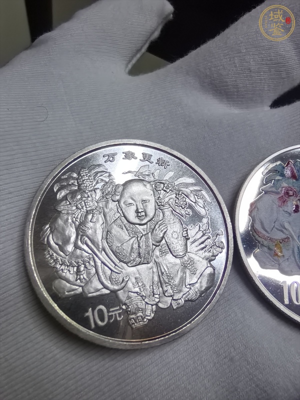 古玩萬象更新銀幣真品鑒賞圖